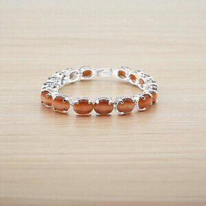 AVON Brown Cat's Eye Glass Bracelet